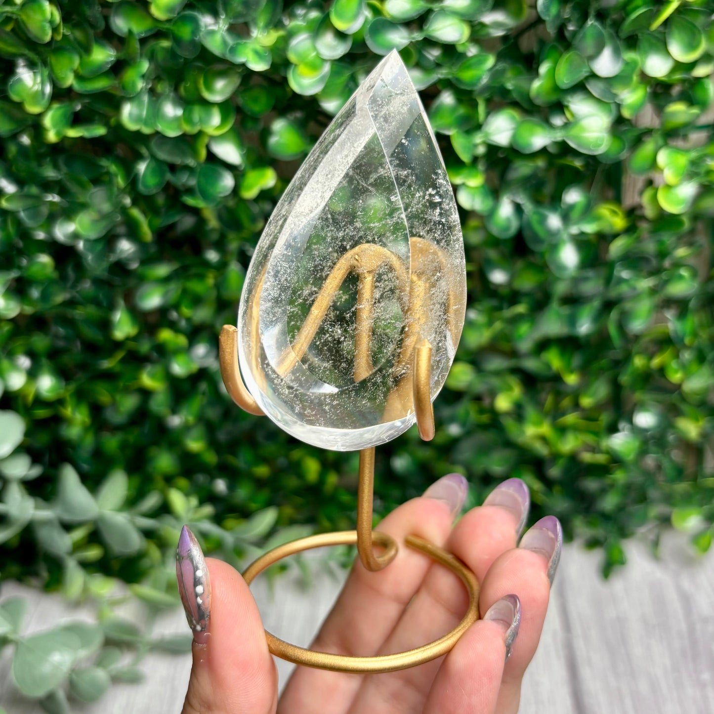 CLEAR QUARTZ POINTS ON STANDS