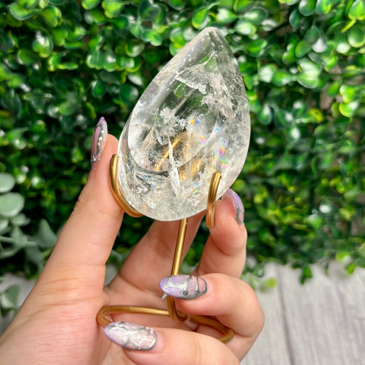 CLEAR QUARTZ POINTS ON STANDS
