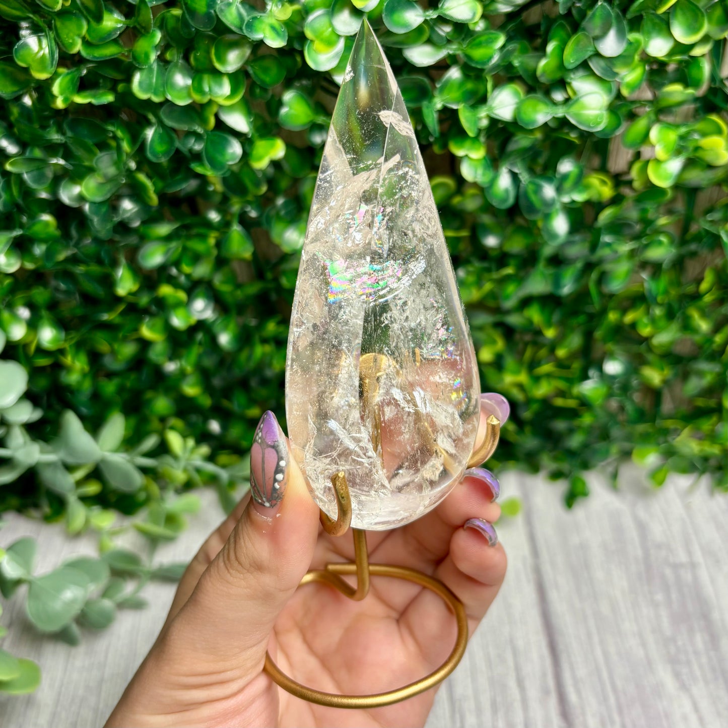 CLEAR QUARTZ POINTS ON STANDS