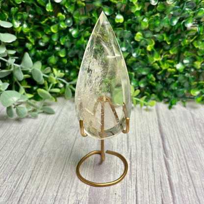 CLEAR QUARTZ POINTS ON STANDS