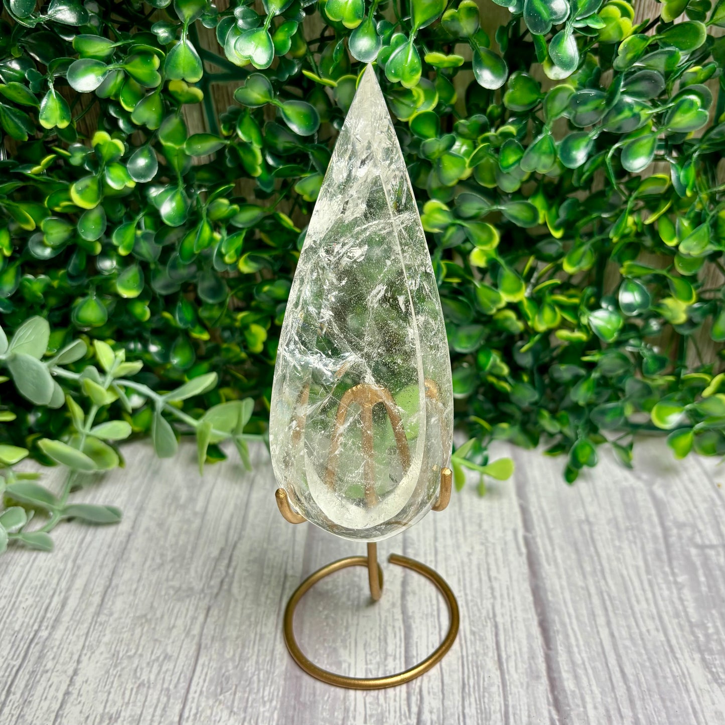 CLEAR QUARTZ POINTS ON STANDS