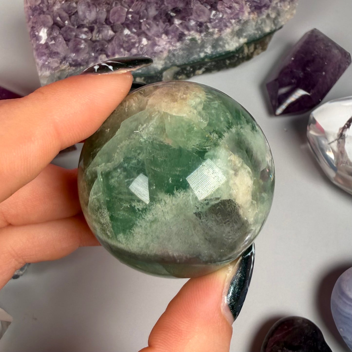 FEATHER FLUORITE SPHERES