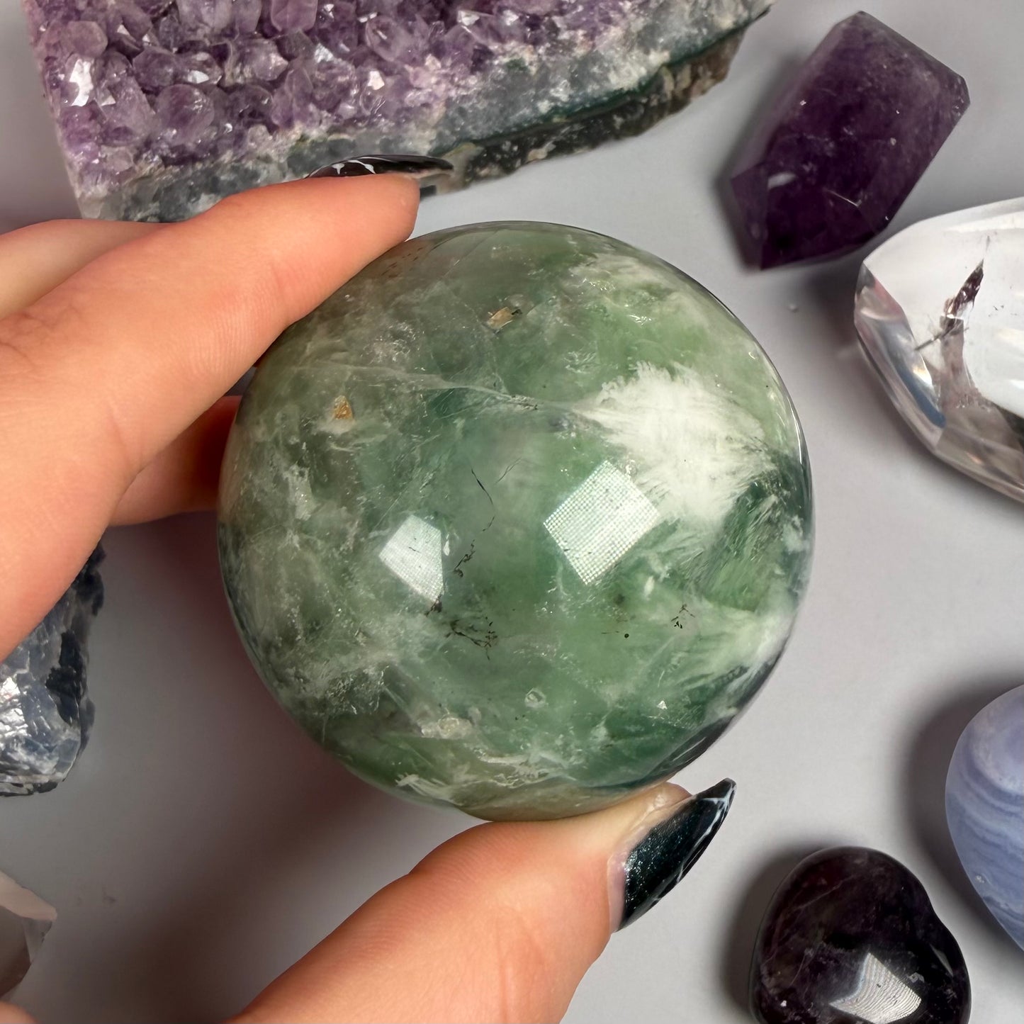 FEATHER FLUORITE SPHERES