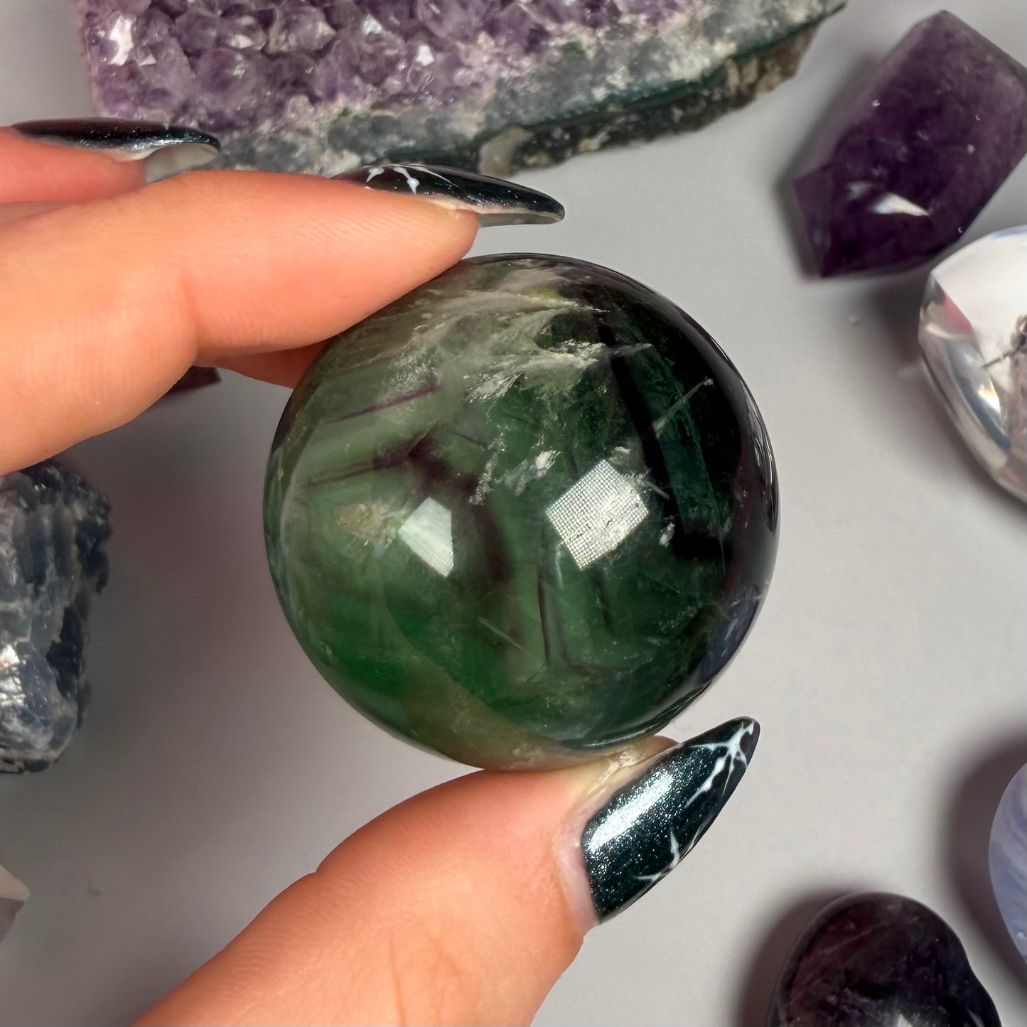 FEATHER FLUORITE SPHERES