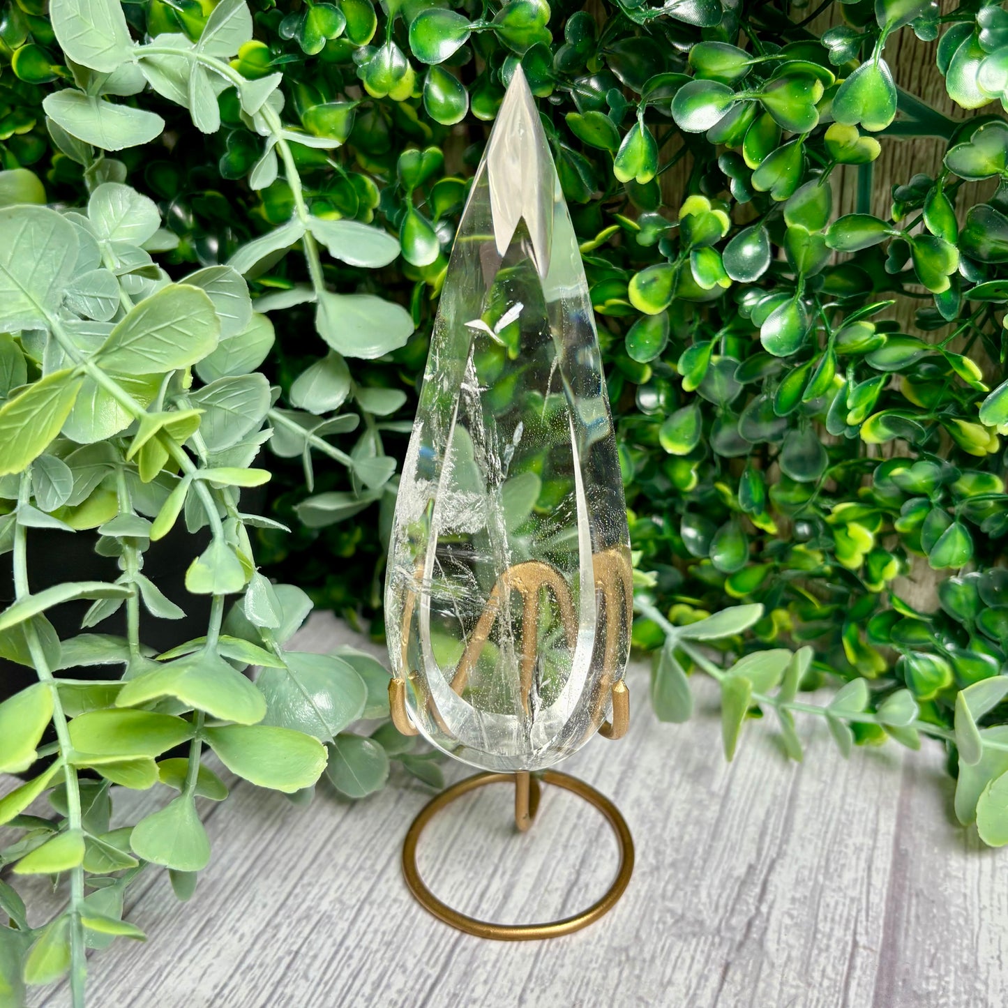 CLEAR QUARTZ POINTS ON STANDS