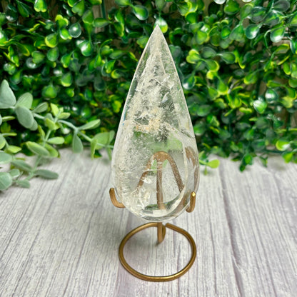CLEAR QUARTZ POINTS ON STANDS