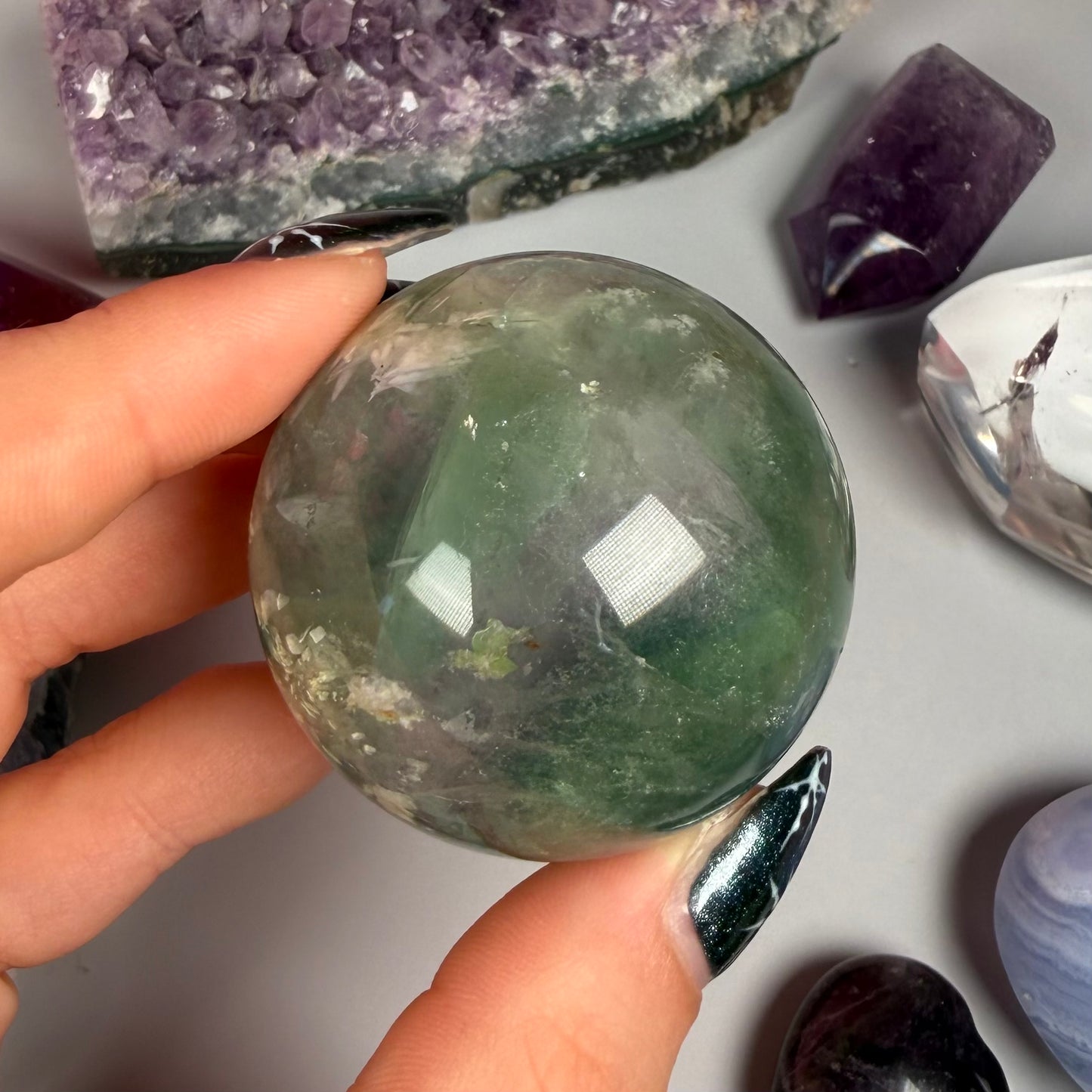 FEATHER FLUORITE SPHERES