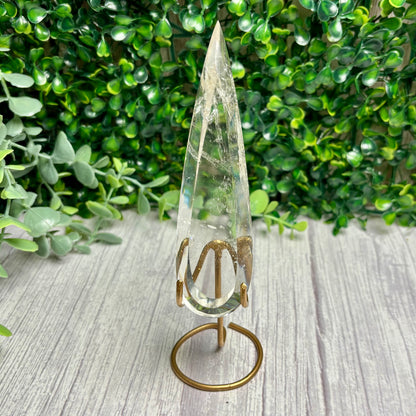 CLEAR QUARTZ POINTS ON STANDS